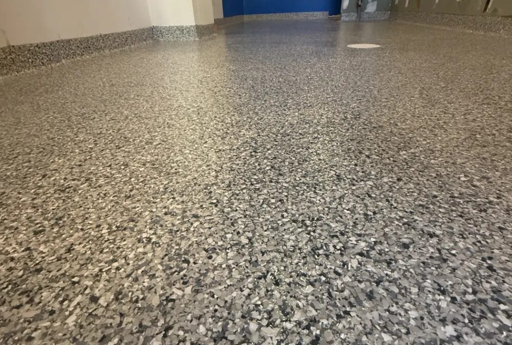Why Epoxy Flake Floors Are Ideal for Garages, Showrooms, and High Traffic Areas